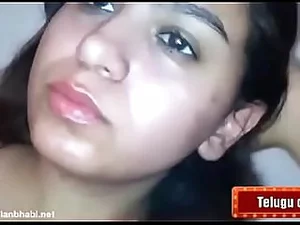 Hot middle-aged Indian aunty enjoys passionate sex with her young lover.
